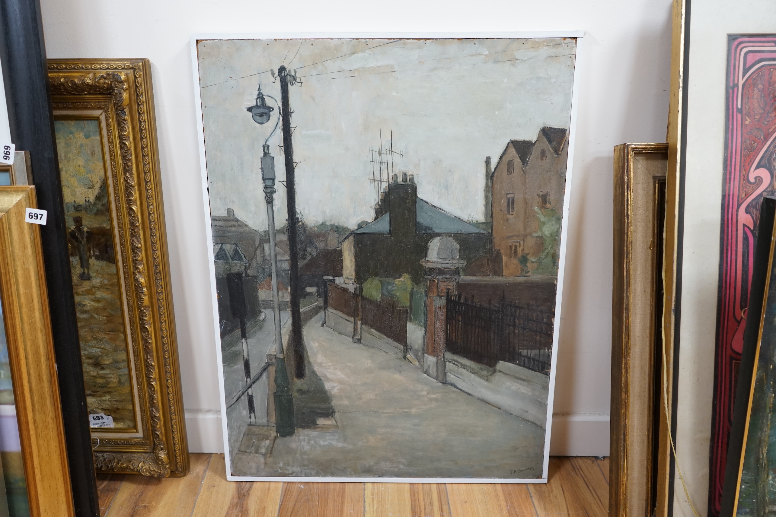 J.A. Brewer (20th. C), oil on board, Northern street scene with gas lamp, signed, 80 x 60cm. Condition - fair to good